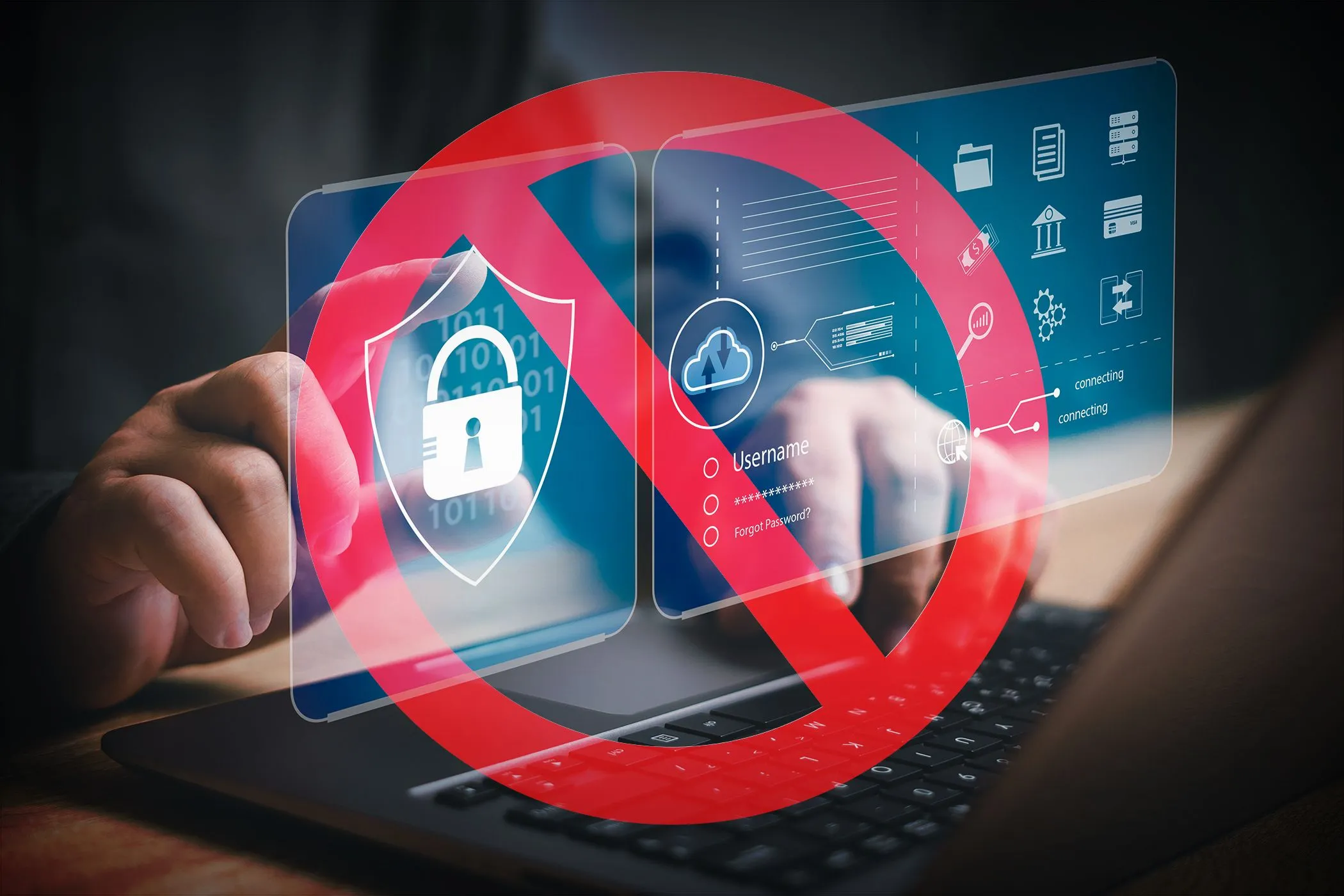 Bàn tay đang gõ laptop với biểu tượng cấm đỏ trên các icon bảo mật, ám chỉ hạn chế quyền truy cập kỹ thuật số.