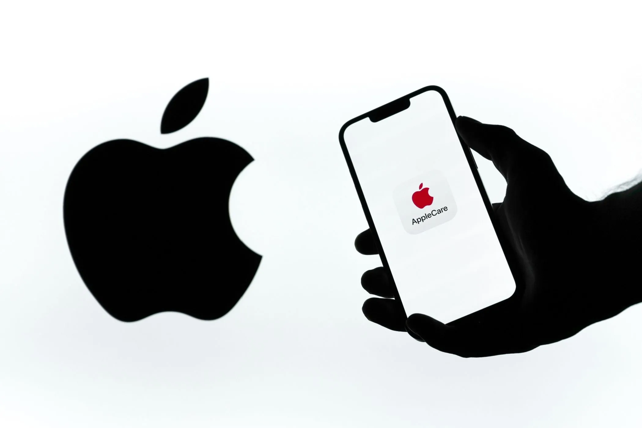 Biểu tượng AppleCare+ trên điện thoại, tượng trưng cho dịch vụ bảo hành chính hãng và hỗ trợ người dùng.