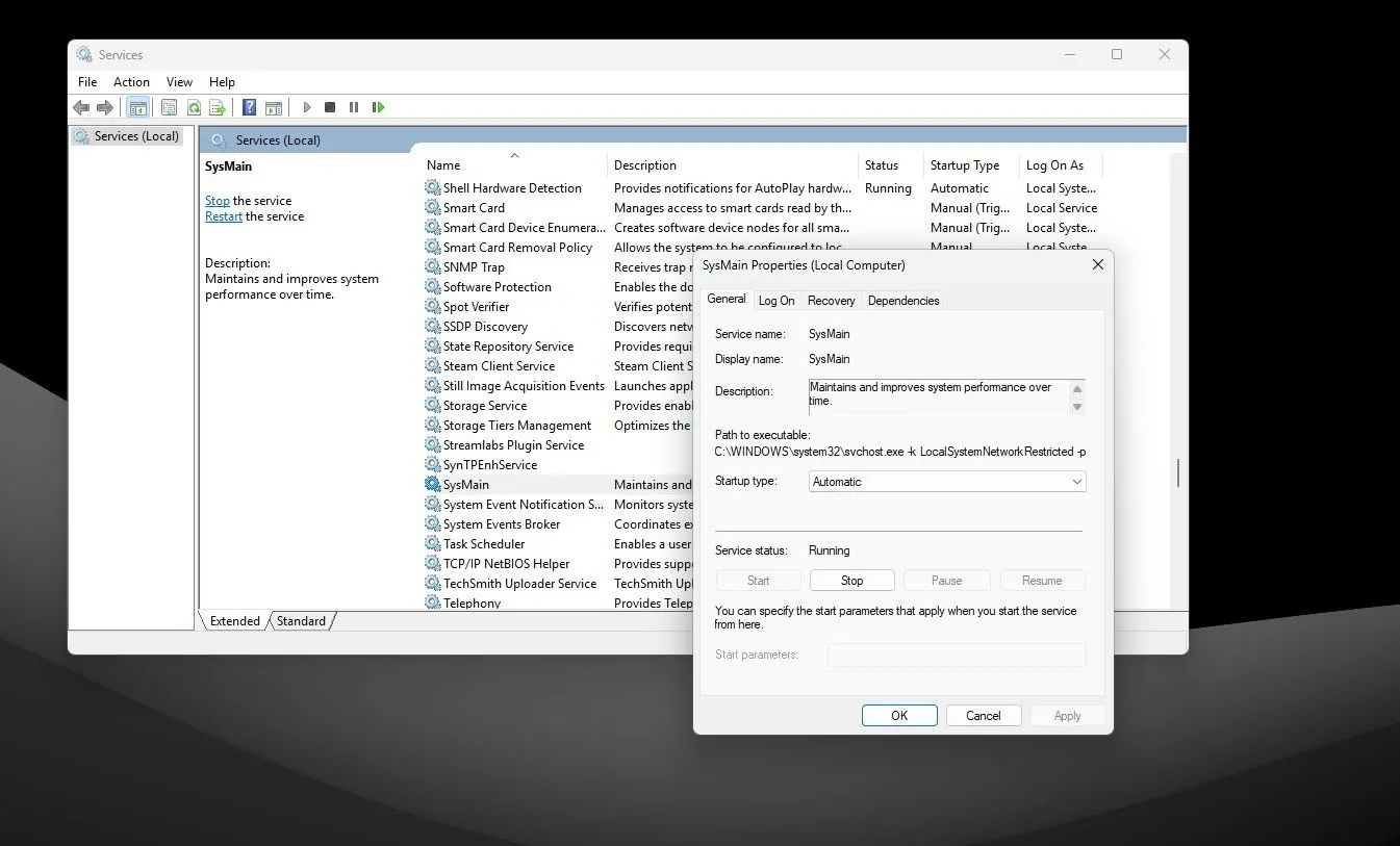 Cửa sổ thuộc tính dịch vụ SysMain trong Windows Services trên Windows 11, hiển thị tùy chọn dừng và thay đổi loại khởi động