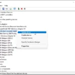 Giao diện Device Manager trên Windows 11 hiển thị tùy chọn "Update Driver" cho bộ điều hợp Wi-Fi Intel AX200, minh họa cách cập nhật trình điều khiển card mạng để khắc phục lỗi Wi-Fi biến mất.