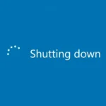 Giao diện màn hình máy tính Windows hiển thị quá trình tắt máy đang diễn ra