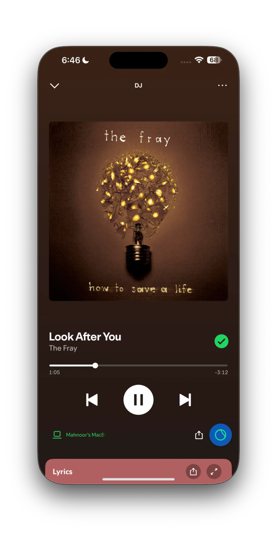 Giao diện phát nhạc của Spotify AI DJ với bài hát 'Look After You' trên ứng dụng