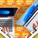 Hai máy tính xách tay và các biểu tượng tệp tin nén báo lỗi, tượng trưng cho sự cố sao lưu dữ liệu.