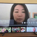 Hình ảnh màn hình TV Samsung Frame hiển thị giao diện YouTube TV đang tạm dừng phát video