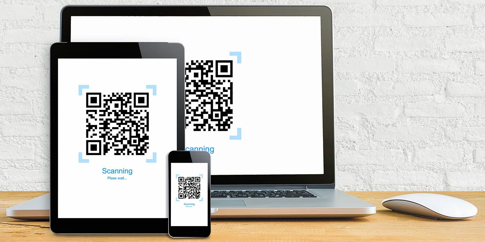 Hình ảnh minh họa mã QR trên laptop, điện thoại và máy tính bảng cho xác thực Gmail.