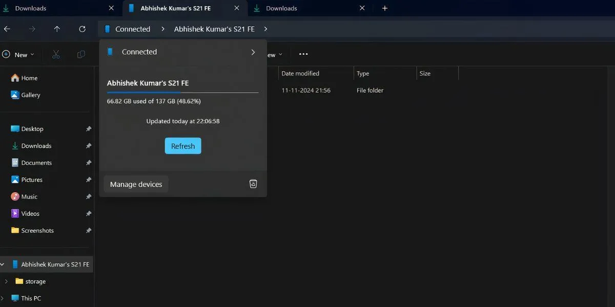 Hộp thoại trạng thái kết nối điện thoại di động trong File Explorer của Windows 11 hiển thị dung lượng và trạng thái đồng bộ