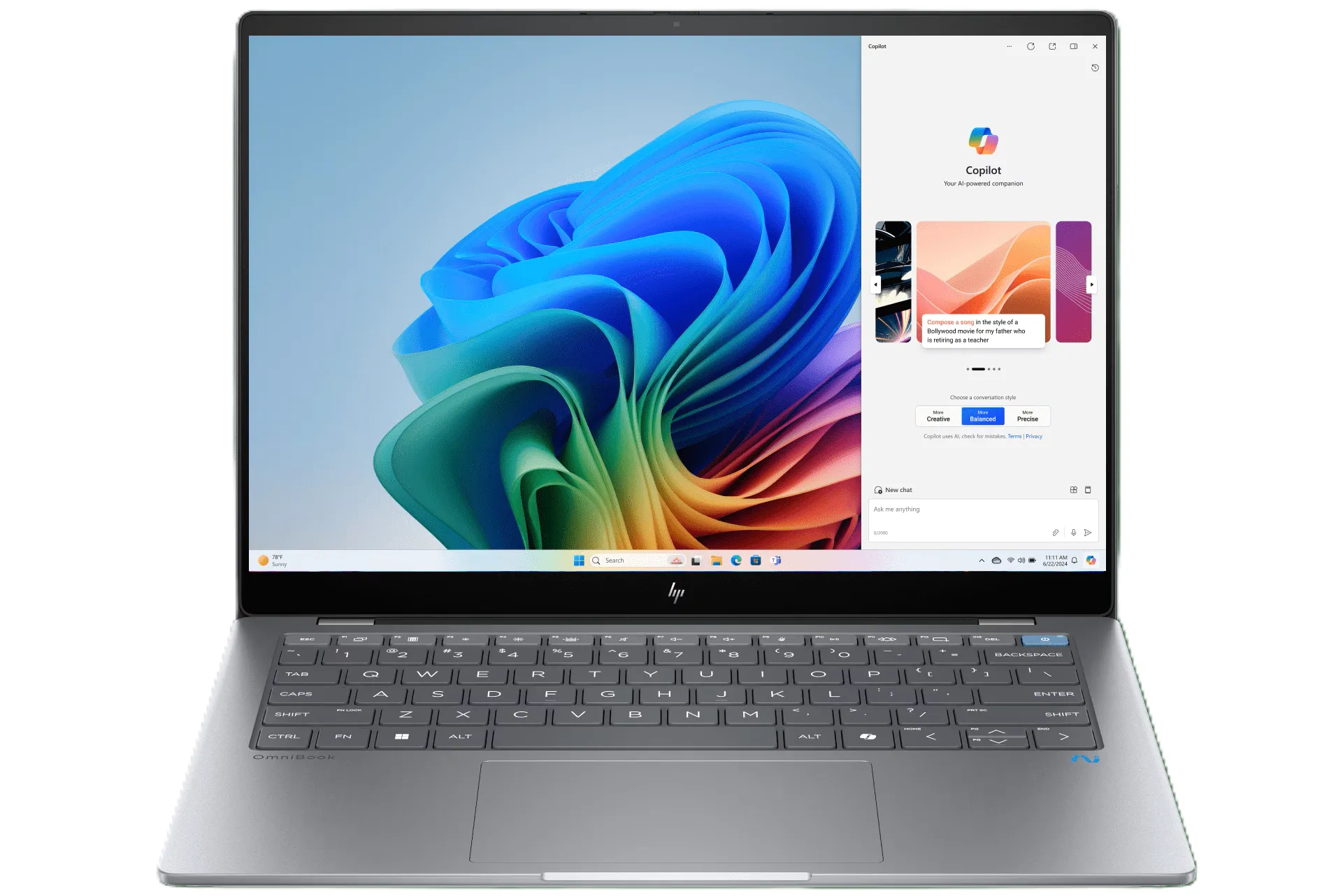 Laptop HP OmniBook X màu xanh đen, hiển thị bàn phím và màn hình
