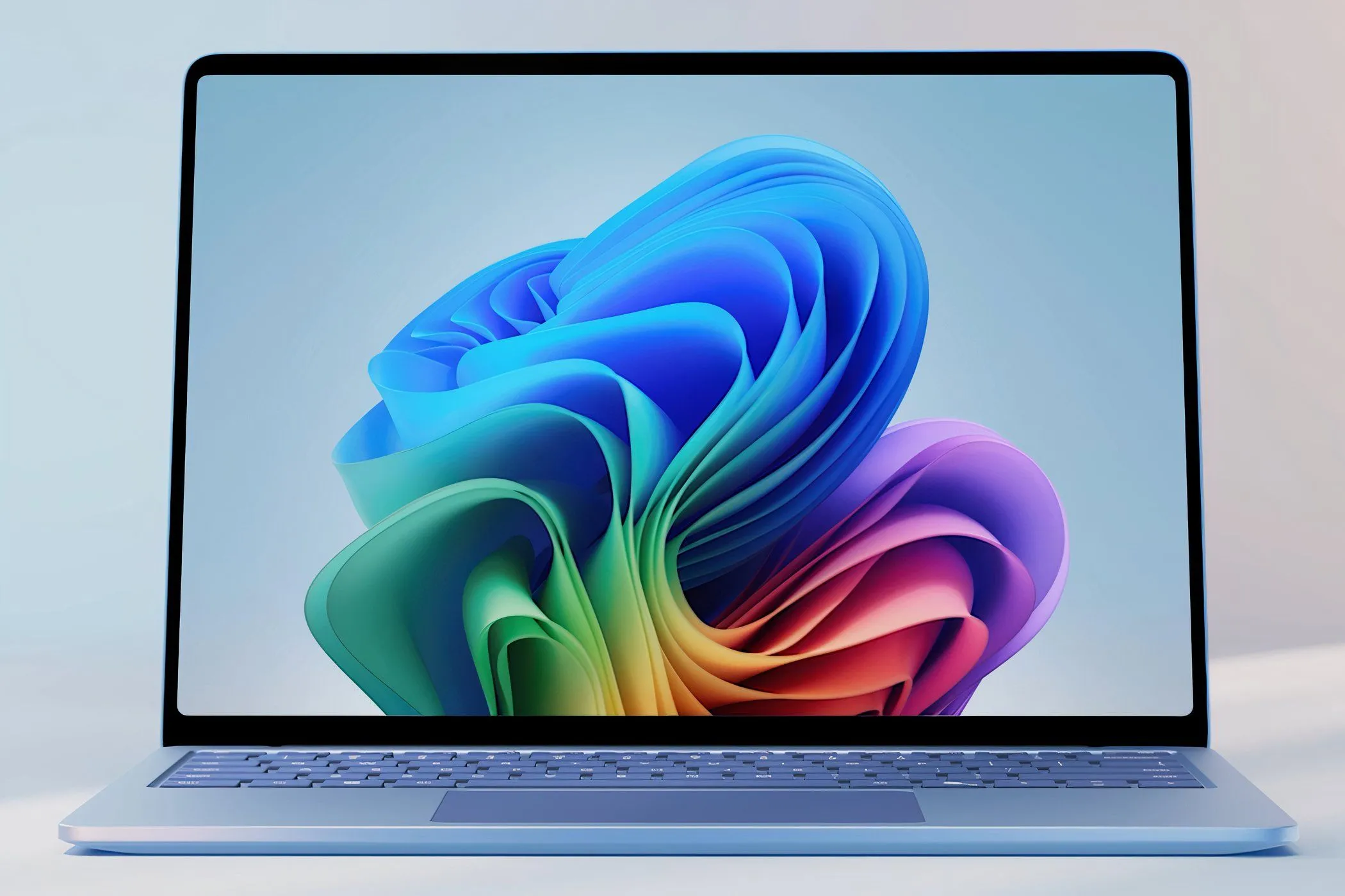 Laptop Microsoft Surface Laptop 7th Edition mở ra, hiển thị màn hình và bàn phím
