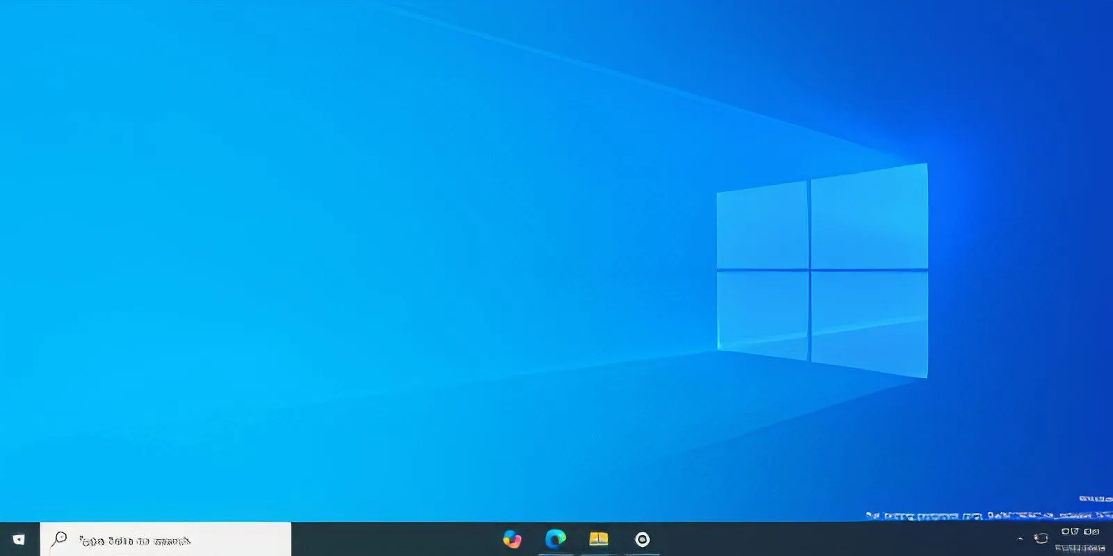 Màn hình nền Windows 10 với biểu tượng ứng dụng Taskbar được căn giữa bằng TaskbarX