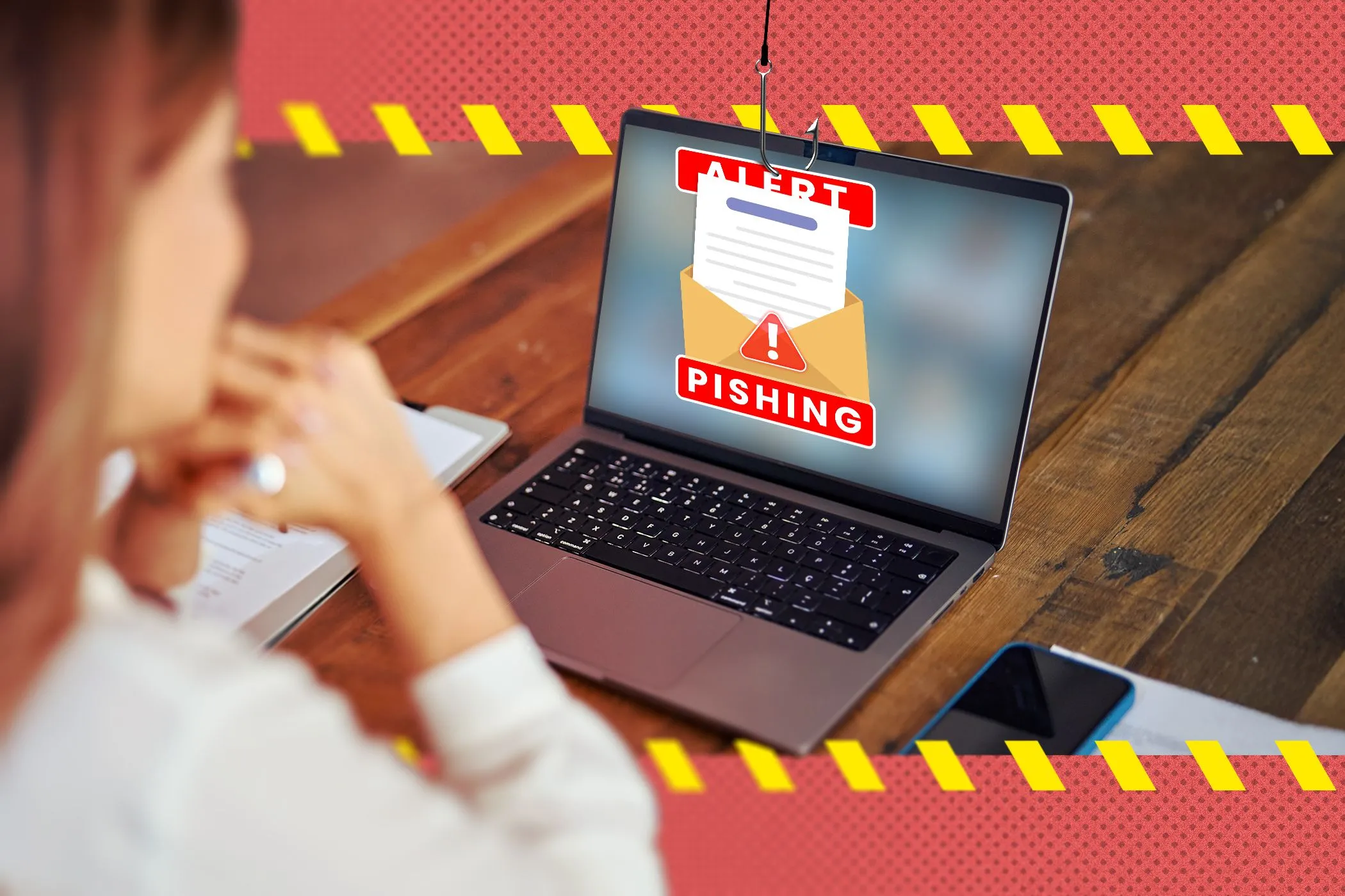 Người phụ nữ đang sử dụng laptop với email lừa đảo phishing hiển thị trên màn hình, cho thấy nguy cơ tấn công lừa đảo trực tuyến