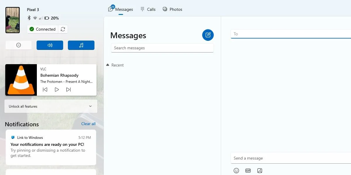 Tin nhắn Phone Link trên màn hình Windows, với VLC đang phát nhạc