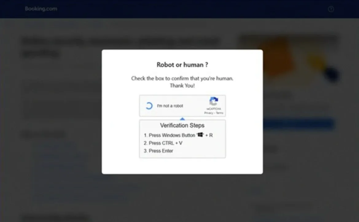 Ví dụ về CAPTCHA giả mạo yêu cầu người dùng chạy lệnh độc hại trong chiến dịch phishing Booking.com